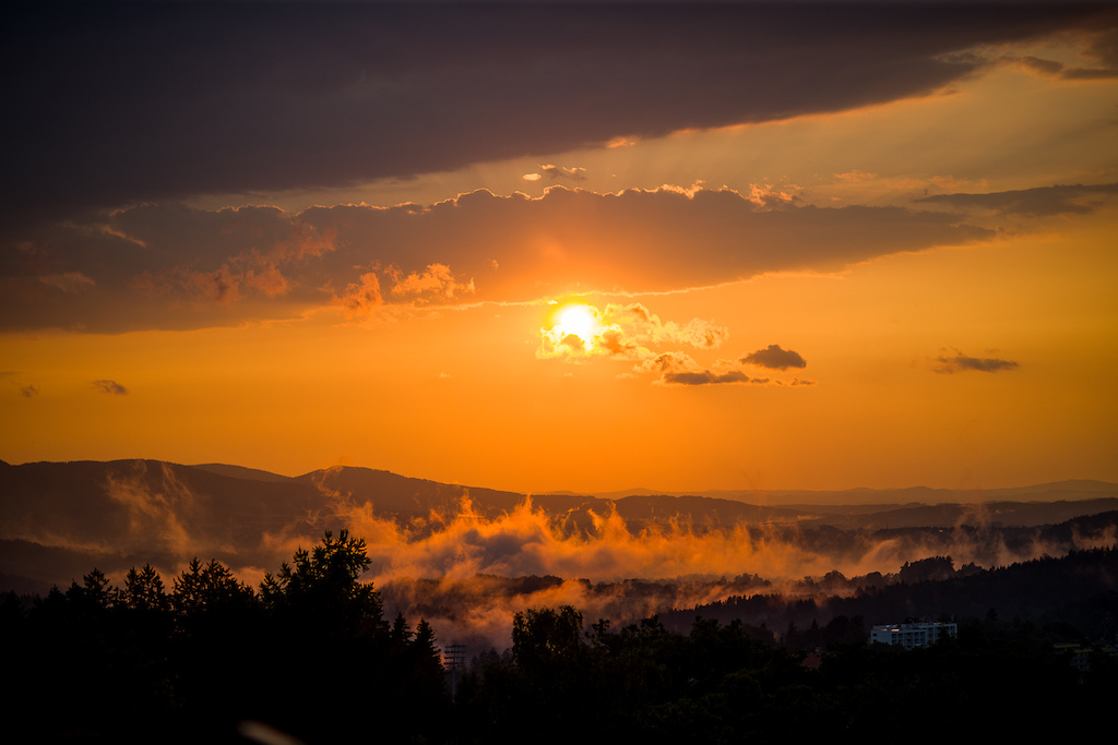 View from the vantage point at sunset after a rain storm during round 4 of The 2023 4X Pro Tour at Hotel Petrin, Jablonec Nad Nisou, Liberec, Czech Republic on July 10 2023. Photo: Charles A Robertson