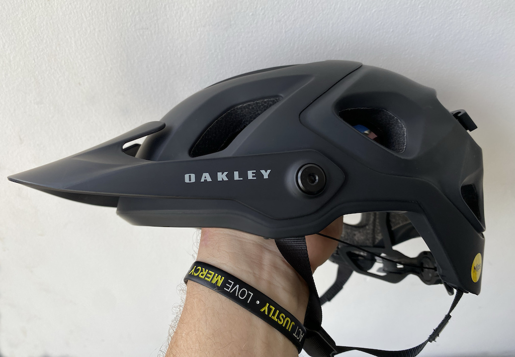 The Oakley DRT5 Trial/Enduro Mnt. Bike Helmet - Profile View. The visor is in the lowest position.