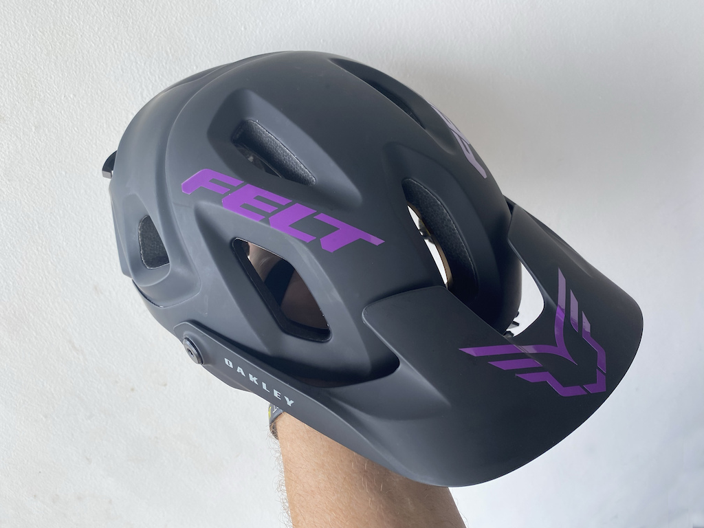 The Oakley DRT5 Trial/Enduro Mnt. Bike Helmet - showing a little Purple FELT "Bling".