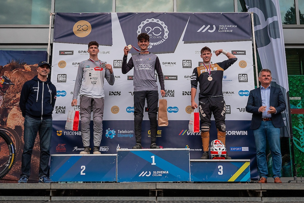 Top three junior men at Kenda DH Pohorje, final round of 2023 20chocolate Downhill Cup, held in Bike Pike Pohorje Maribor on 8 October. Photo by Anže Furlan.