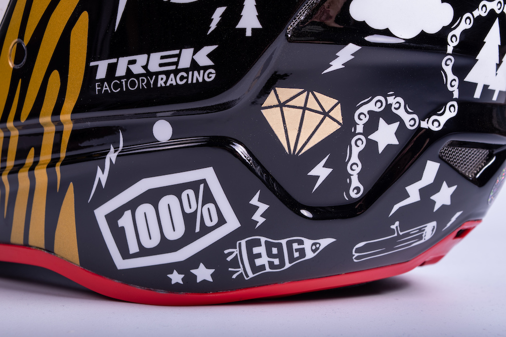 Custom painted helmet to celebrate Reece Wilson's 2020 World Champs win. Zebra stripes, loads of little illustrations, black and gold. Gold medals are a good excuse to break out the gold leaf!