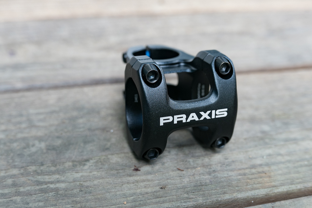 Praxis' New Flat Pedals, Stem, & Carbon Bottle Cage - Pinkbike