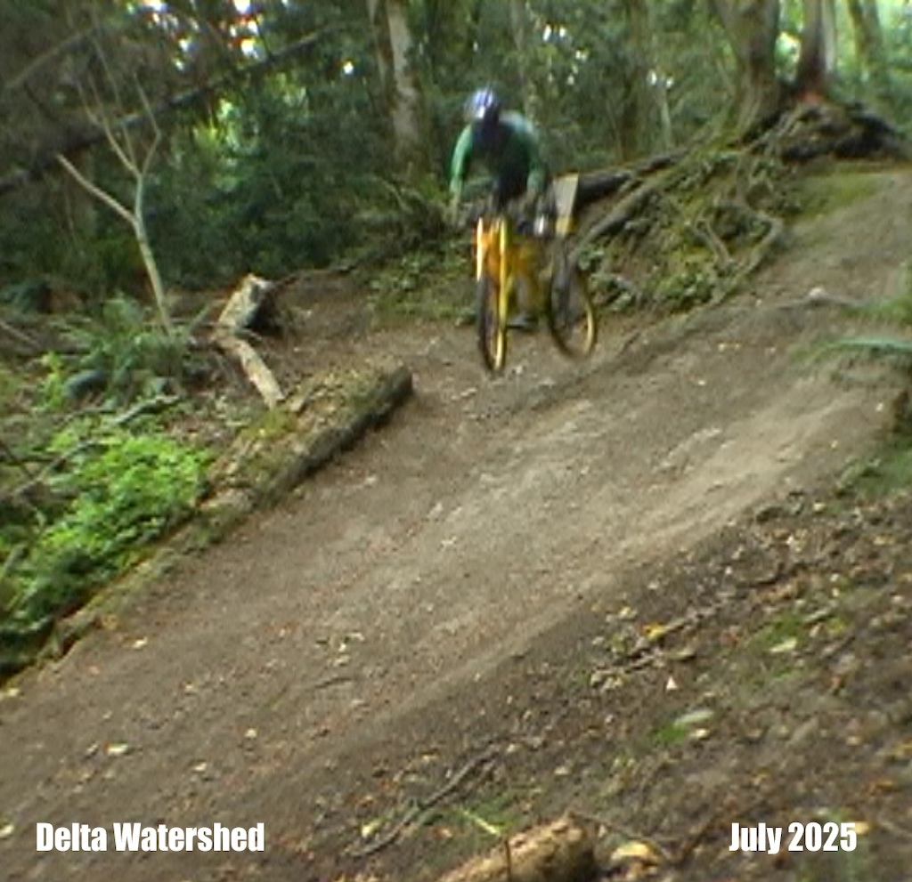 DH Dave blasts off the valley drop jump in the Delta Watershed