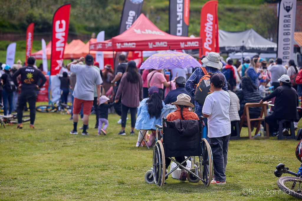 This is what makes Santísimo Downhill truly special. The community of San Isidro de Chicón, Urubamba - Cusco turns out in full force to celebrate the 12th edition of one of South America's most beloved downhill races, filling the finish area with the warmth, color and genuine spirit of the Andean people. Young and old, families and neighbors, everyone together on the same green grass that has welcomed the world's riders for over a decade. A grandmother in her wheelchair, brought by a caring hand to witness the spectacle her mountain hosts. Children running free. Locals and visitors side by side. No ticket required. No barrier between the sport and the people who give it its soul. This is Chicón. This is the heart of Santísimo Downhill