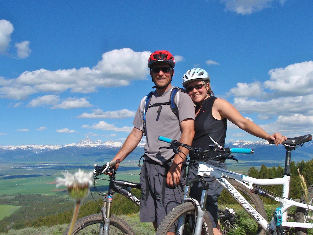 Riding in the Big Holes. Tetons in the back ground.