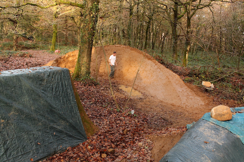 Berm on flow line, another day or two and we'll have this finished.