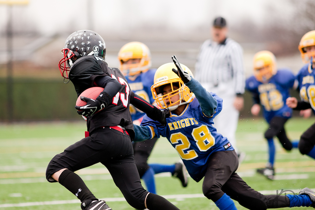 Went and shot my nephews Football game today with the new 200mm Lens.  They won and are the BC Champs!