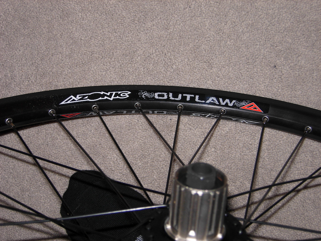 new azonic outlaw wheelset, got it from crc for half off, for all of you people who think they are heavy you obviously have never held them before