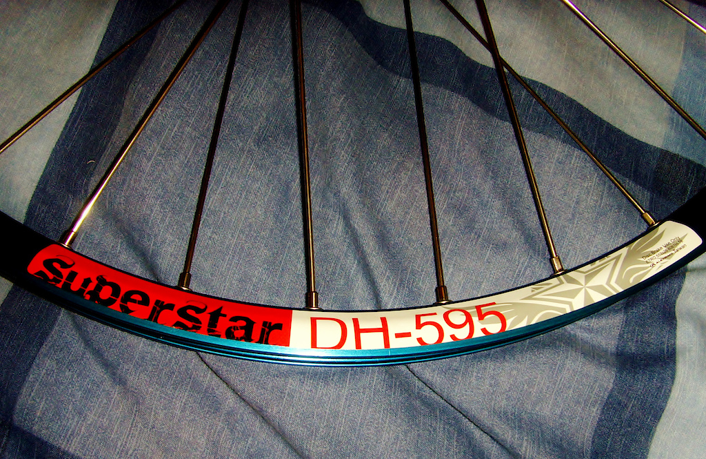superstar DH595 laced to superstar switch evo hub