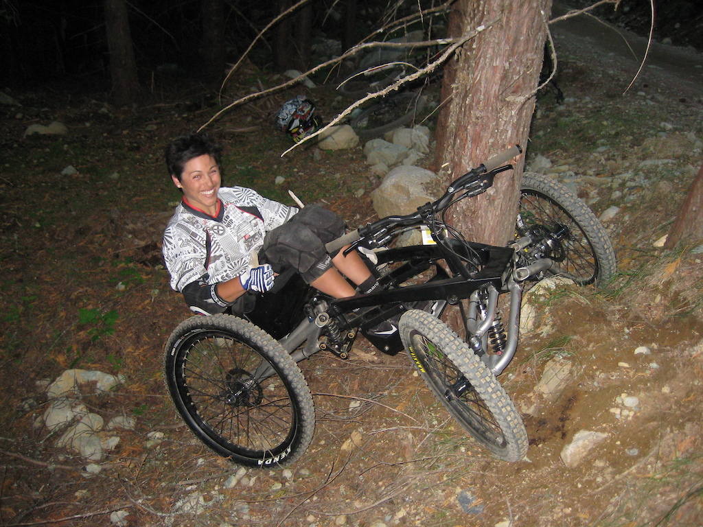 Photo by Elladee Brown (1st time riding 4-wheel DH bike, crashing, and wrapping it around a tree. LOL! Whistler 09')