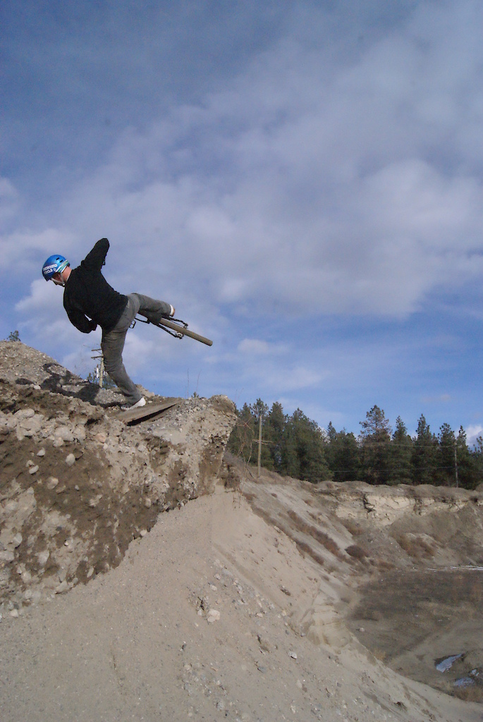 Footplant, big sketchy crumbly sand ledge, with large cliff.

Mostry photo cred.