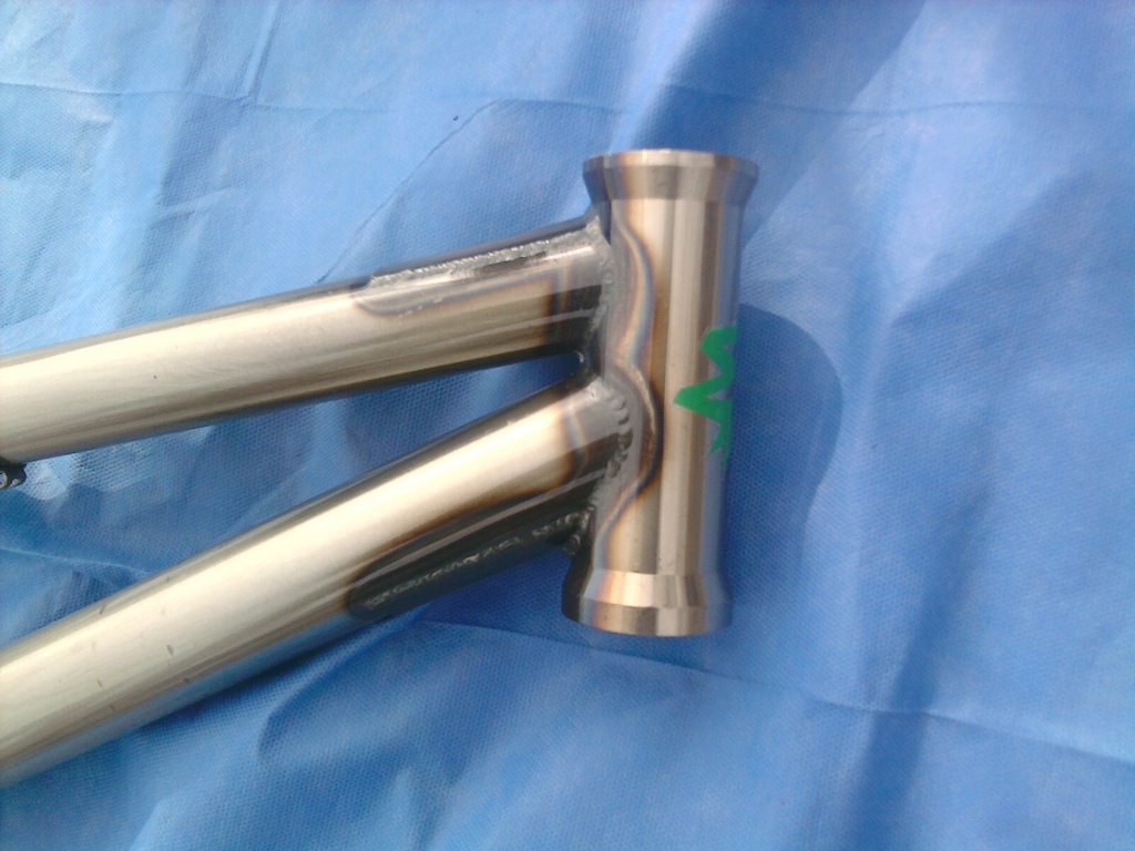 Close up of headtube welded to toptube and downtube finished