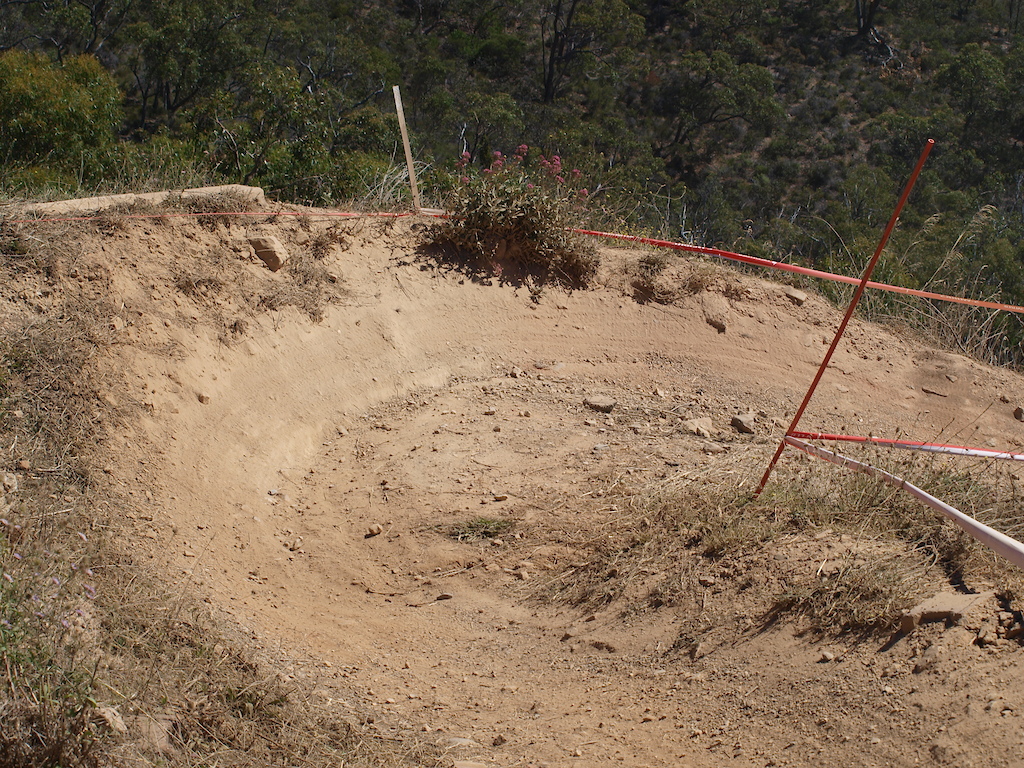 The left corner after the rock gap is followed by a right hand berm, these corners are tight and with dry conditions perfect for a bit of drift!