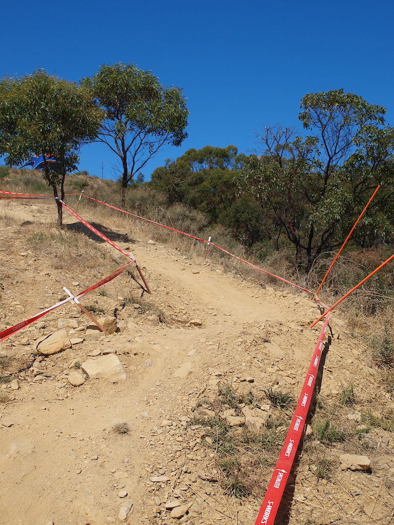 A few shallow corners exsist as riders continue down the ridge.