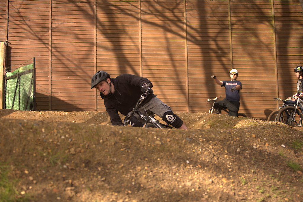 Mike leaning into the berm on the pump track