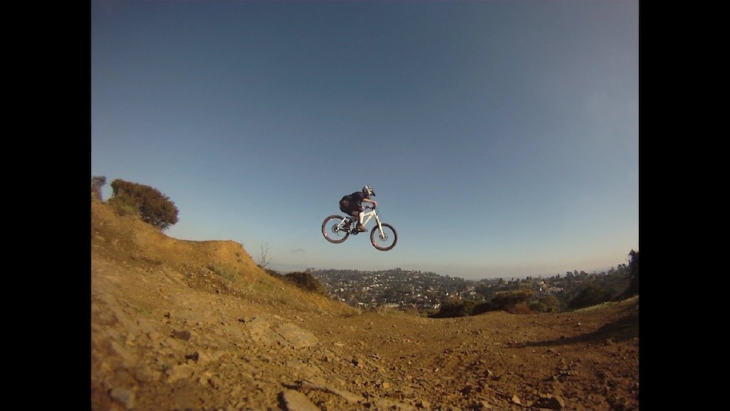 Evil Knievel Style-Jumpin over the city. Cleared it!