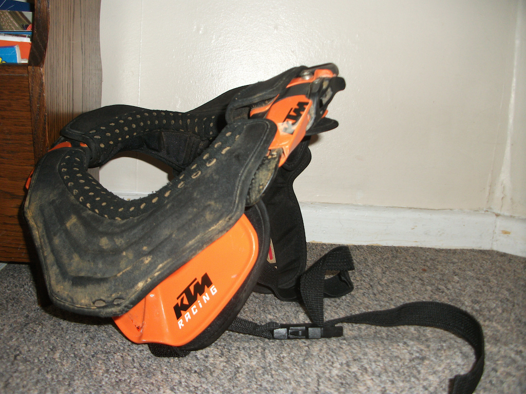 This is a Leatt KTM neck brace that is used for motocross, i got it for free though as my friend does motocross racing and he gave this to me to use for DH.