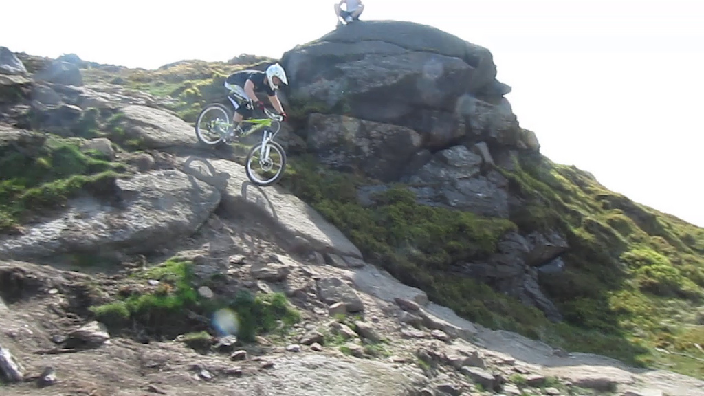 Rolling down the rock slabs at the top of the forest. Scott Voltage FR 30.