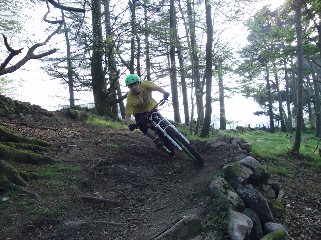 Hitting the right hand berm. With his eyes closed.