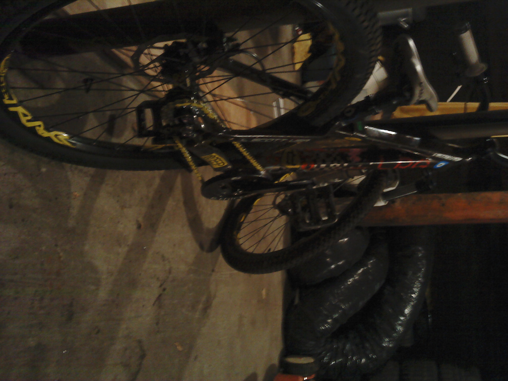My bike, i stripped the sticekrs off and added the KMC yellow chain