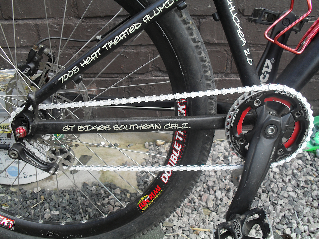 Surly SS Tensioner.
Double Track 26" Pair Juicy Three, replaced by M4 now.