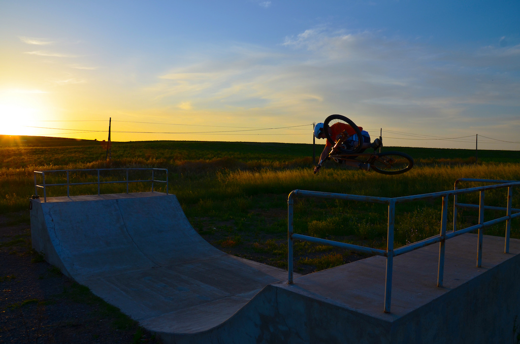 On the way back from south Portugal, about an hour south of Lisbon, there is a halfpipe surrounded by rolling hills and fields. The lighting was great so we stopped for some pictures and video. Photo credit goes to Adam Dudzinski