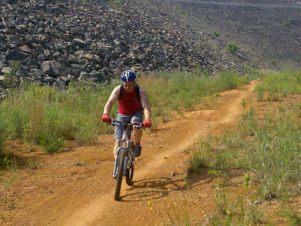 Mike C. took this action shot on an open part of the trail. Hot that day!