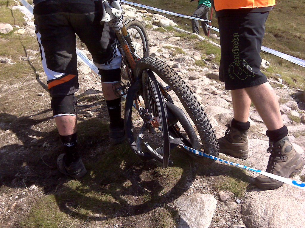 Friday practice at Fort William. Easton Carbon rim failure at the first rock garden.