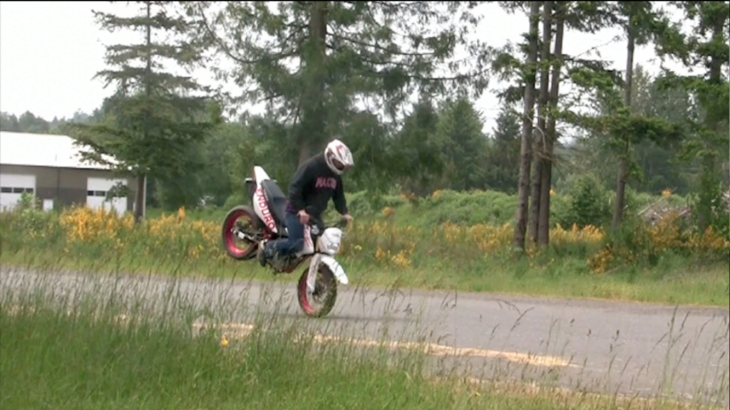 Working on stoppies with my new Motard. $1,250 DELIVERED~! lol www.mefast.com