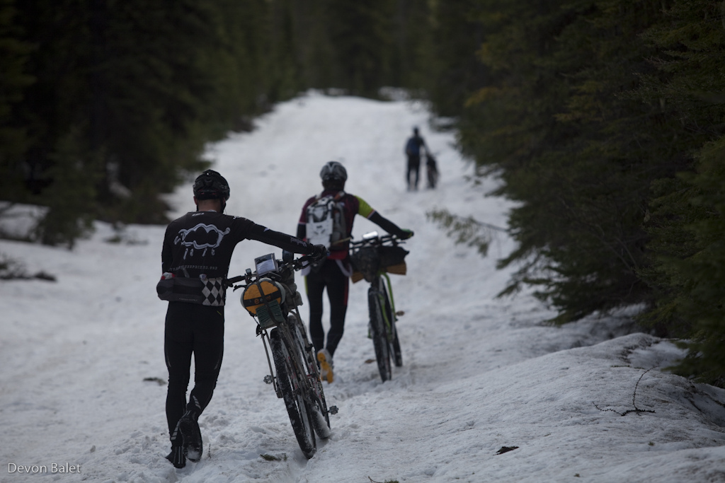 Making their way off Stryker Pass, 11 miles of hike-a-bike through snow.