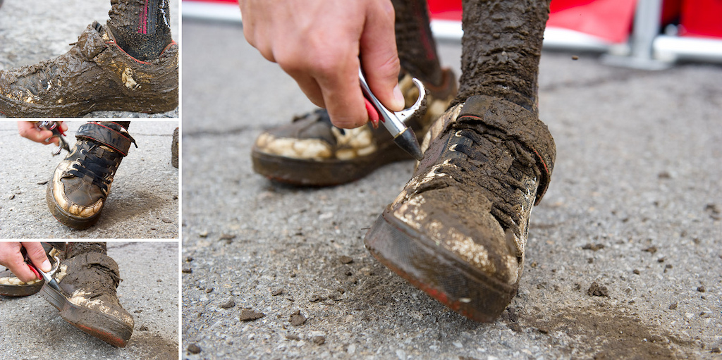 The first few days at Mont Sainte Anne were wet and muddy. Greg Minaar takes advantage of the air hose at the SRAM trailer to clean the mud off of his shoes.