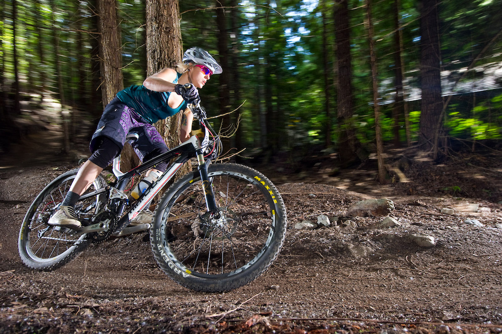 Fanny Paquette, Whistler local and rockstar absolutely killing it on the pinner XC bike--there ain't no dropper post on that Trek full suspension XC ride.