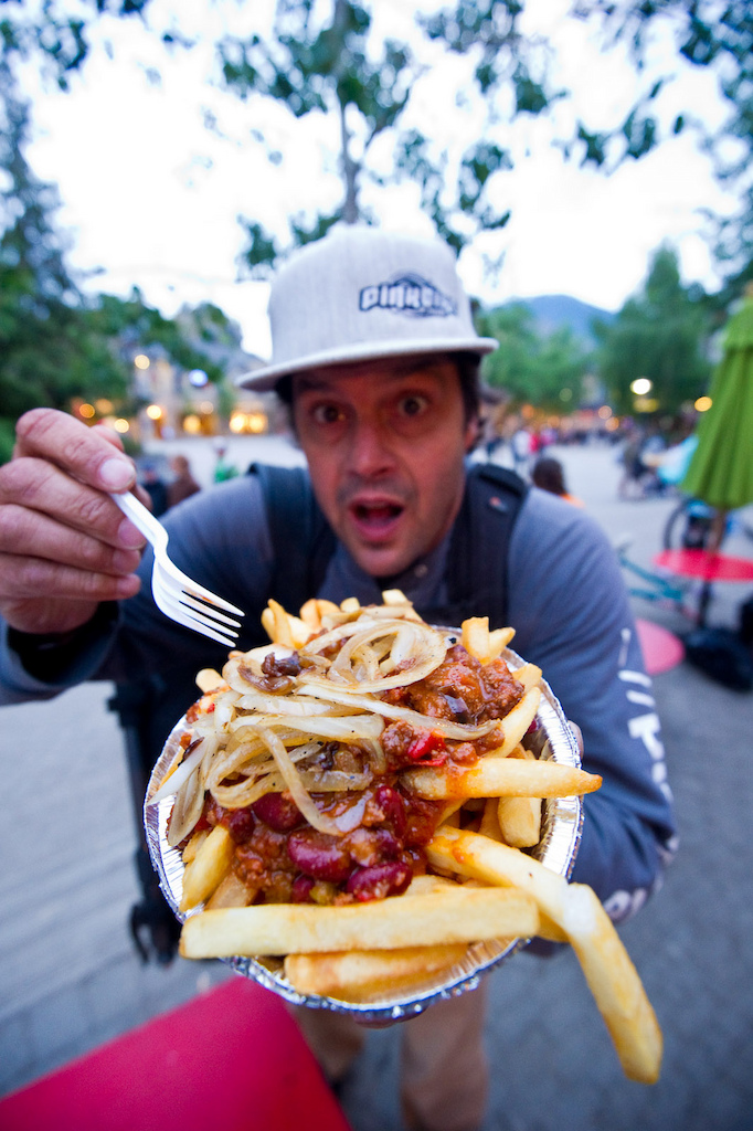 It ain't a night out on the town without some Poutine to clog your arteries. But after a day of grinding on the tracks, toting a 45 lb bag filled with camera gear, there ain't nothing better.