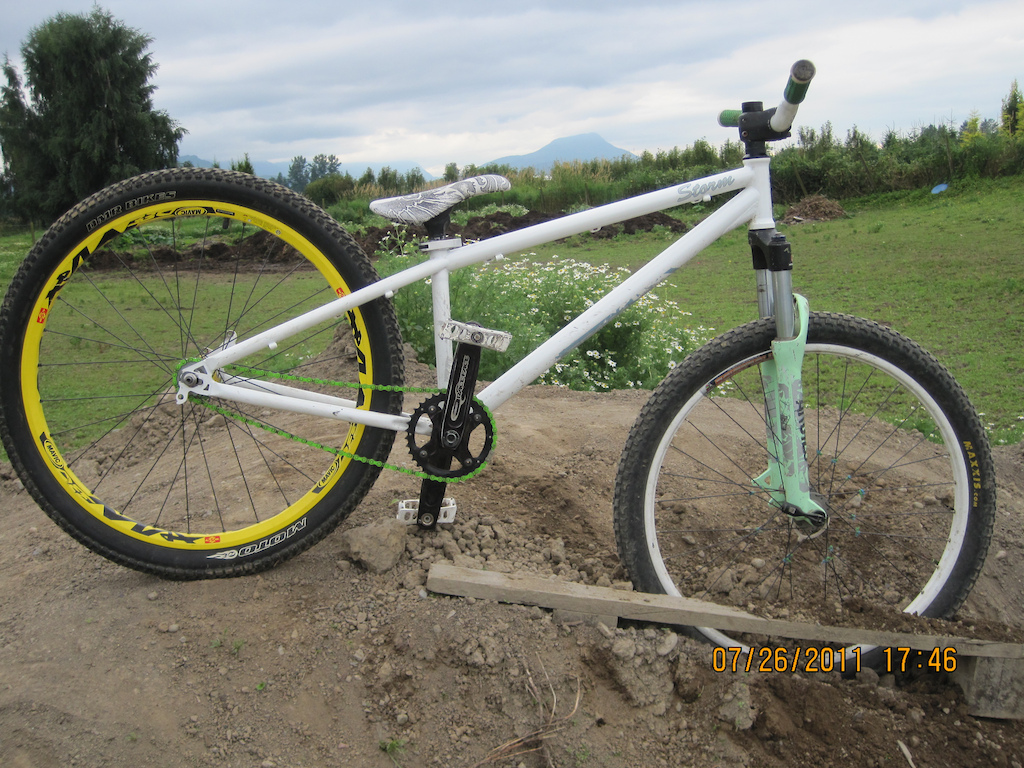 my bike after i got a deemax, tire and tube and diabolus cranks
weight= 28 pounds without brakes