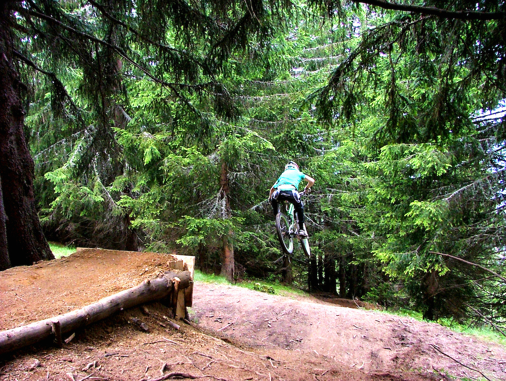 road gap in the woods on hattack run at the top of super morzine