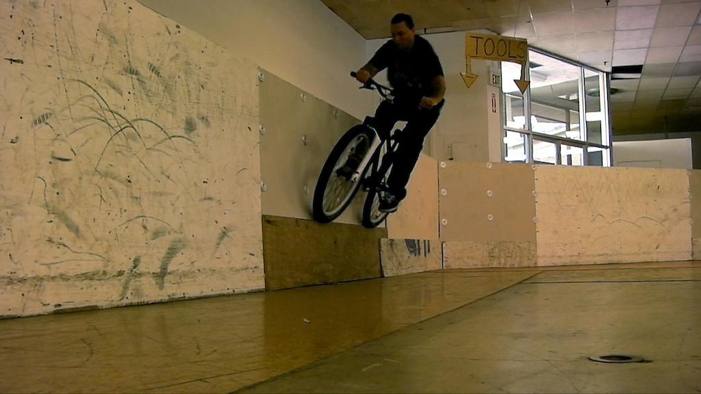Double tire ride on a 1/2" piece of plywood. This is a still frame from a video clip.