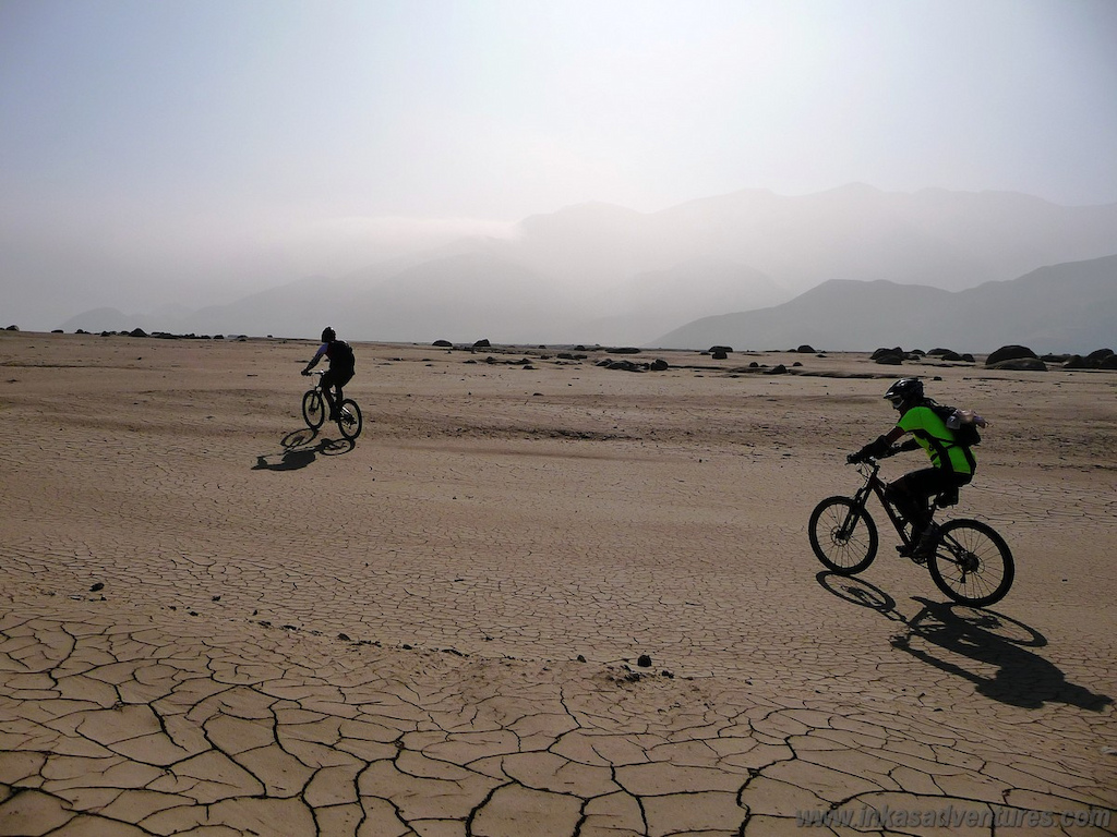 Riding the dried riverbed.