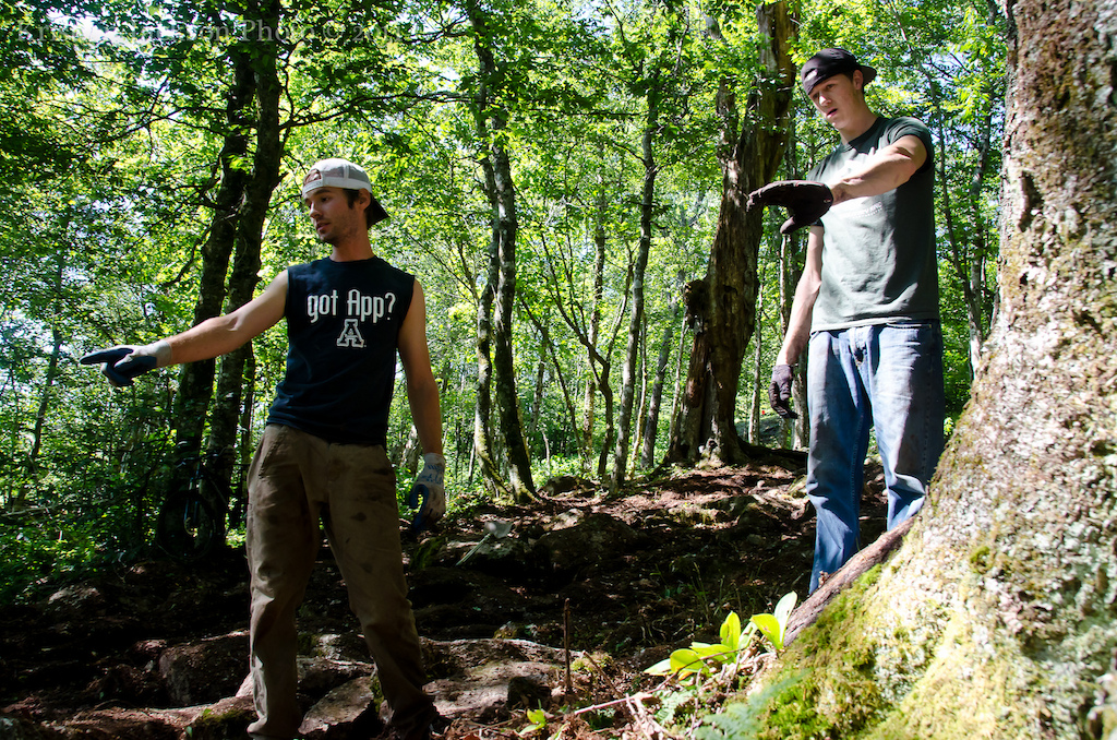 Test Ride of the USA Gravity Nationals Course. Course is closed. Please do not ride it.

Michael Thomas and Danny Cesare plan the final moves for another large stone. The build team worked the rock garden by hand for days.