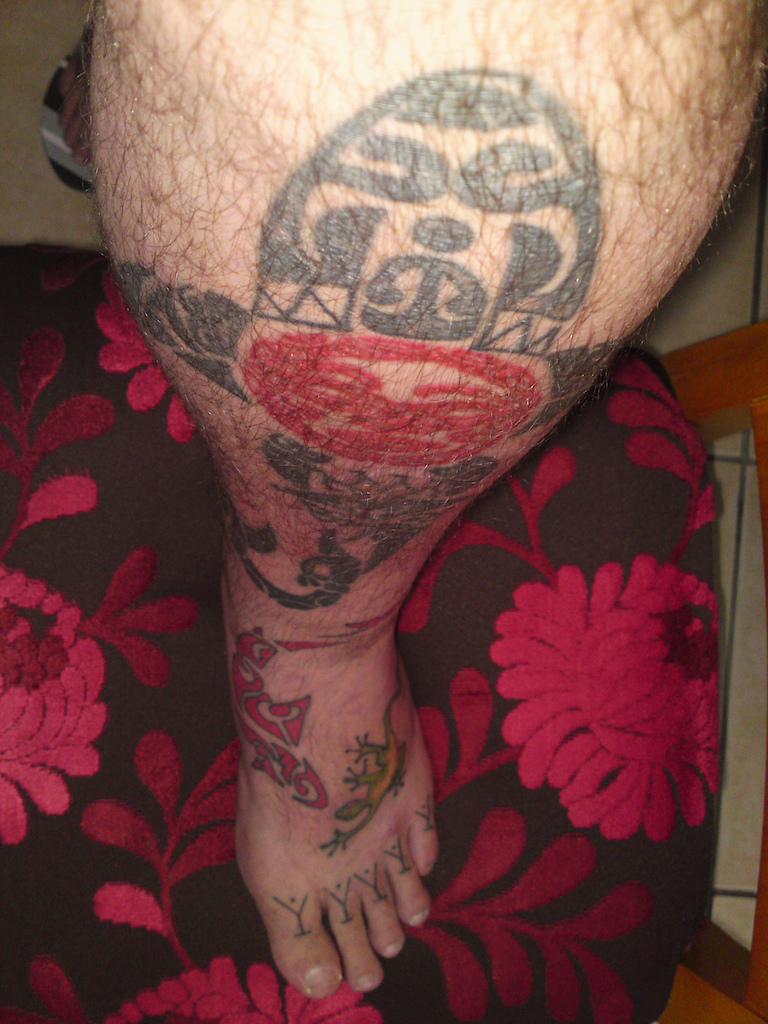 A view of my left shin. A few designs in there....a manta ray, turtle, tribal face and a polynesian serpent.