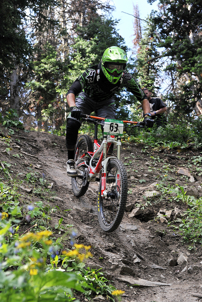Dylan Brown Independent Record - Cat 1 winner and fastest overall time rider Havier Lopez Ruiz, riding for Specialized - Fox Mexico, comes down the waterfall section of the Lone Peak Revenge downhill race course to receive a time of 2:43 Sunday.
