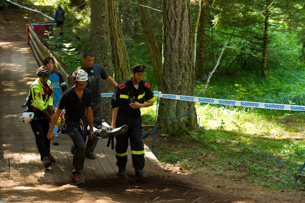Off the bike here is serious business. There were 3 heli flights out yesterday during training. Filip Polc of MS-Evil was able to walk away from his encounter with a tree, but course medics opted to play it safe and haul him out on a backboard for a complete evaluation. So far  reports are that Polc will be ok.