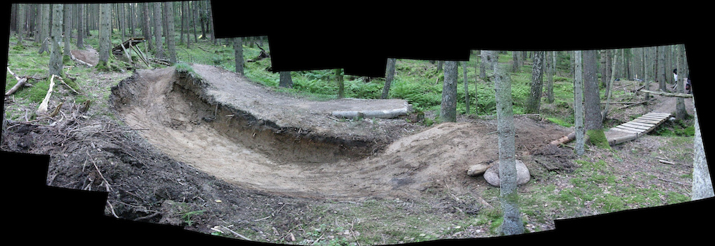 A couple of recessed berm as an alternative route to the wood sender.