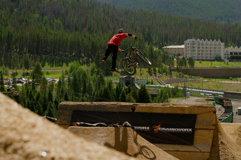 Tailwhip into the fruit bowl at Crankworx with 5 days on the bike after a 3 month injury. Photo: Drew Vandergriend
