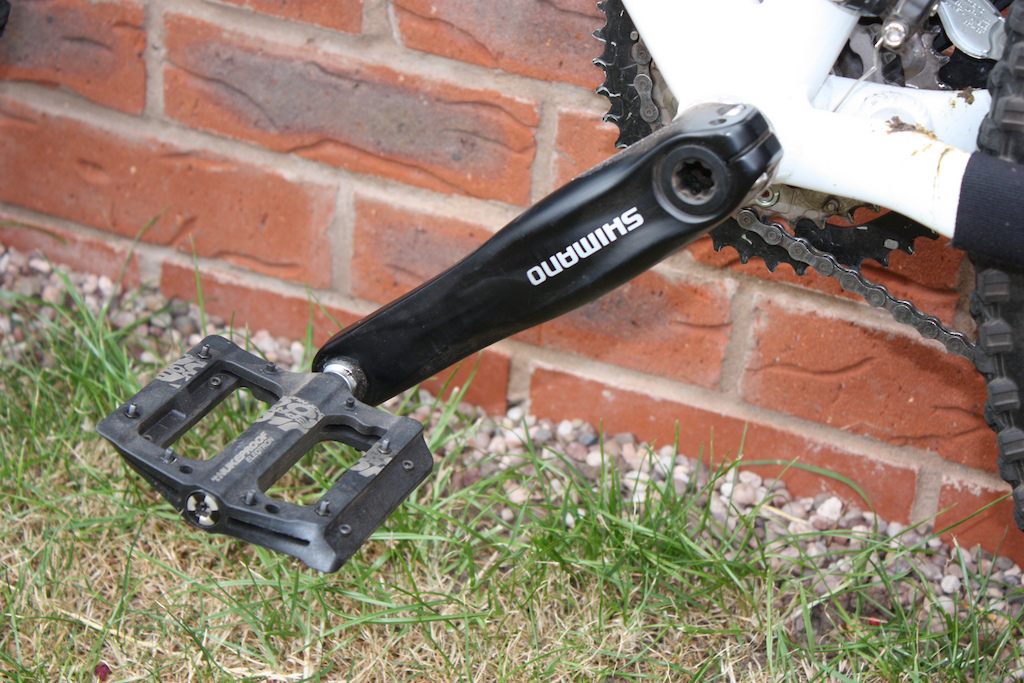 Nukeproof pedals and Shimano crank.