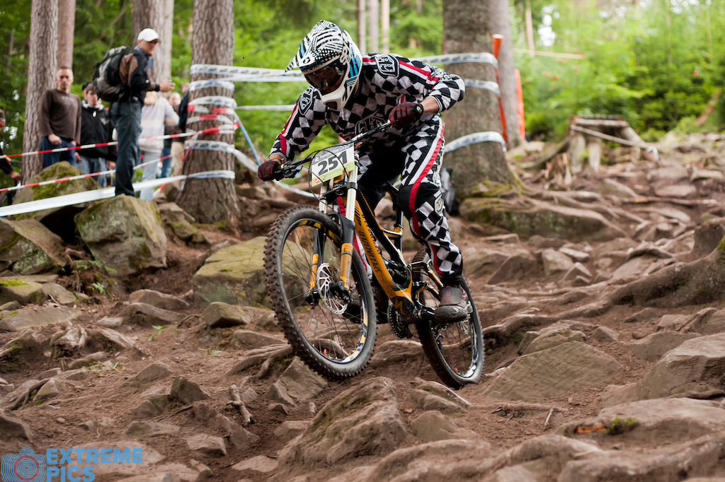 iXS German National Championships race action showing the huge root sections to be found in the Black Forest.