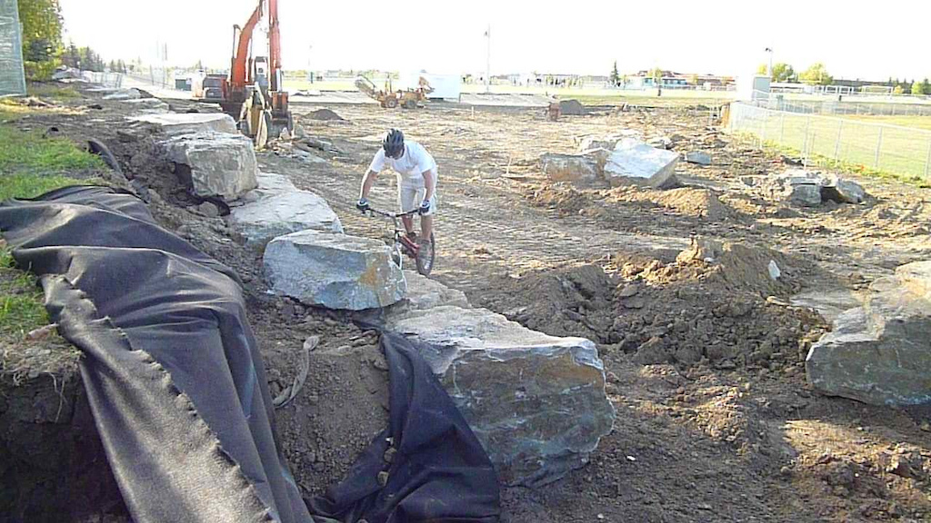 they had a bunch of the rocks for the end of the wall laying out and about...fun stuff, especially good to ride with felix :D