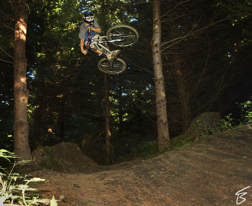 Ryan was hucking this jump left and right. This is a pretty sweet line on Galbraith Mountain known as pump track. This shot was fun because we all got involved with it, and upon landing Ryan almost took me out lol. Fun day though!!