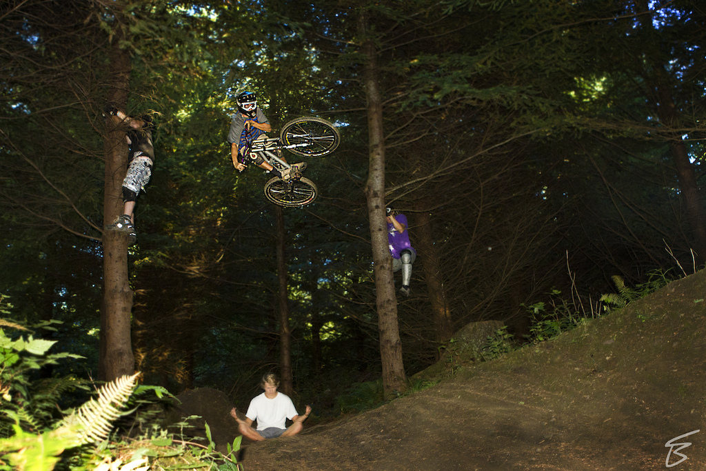 Ryan was hucking this jump left and right. This is a pretty sweet line on Galbraith Mountain known as pump track. This shot was fun because we all got involved with it, and upon landing Ryan almost took me out lol. Fun day though!!