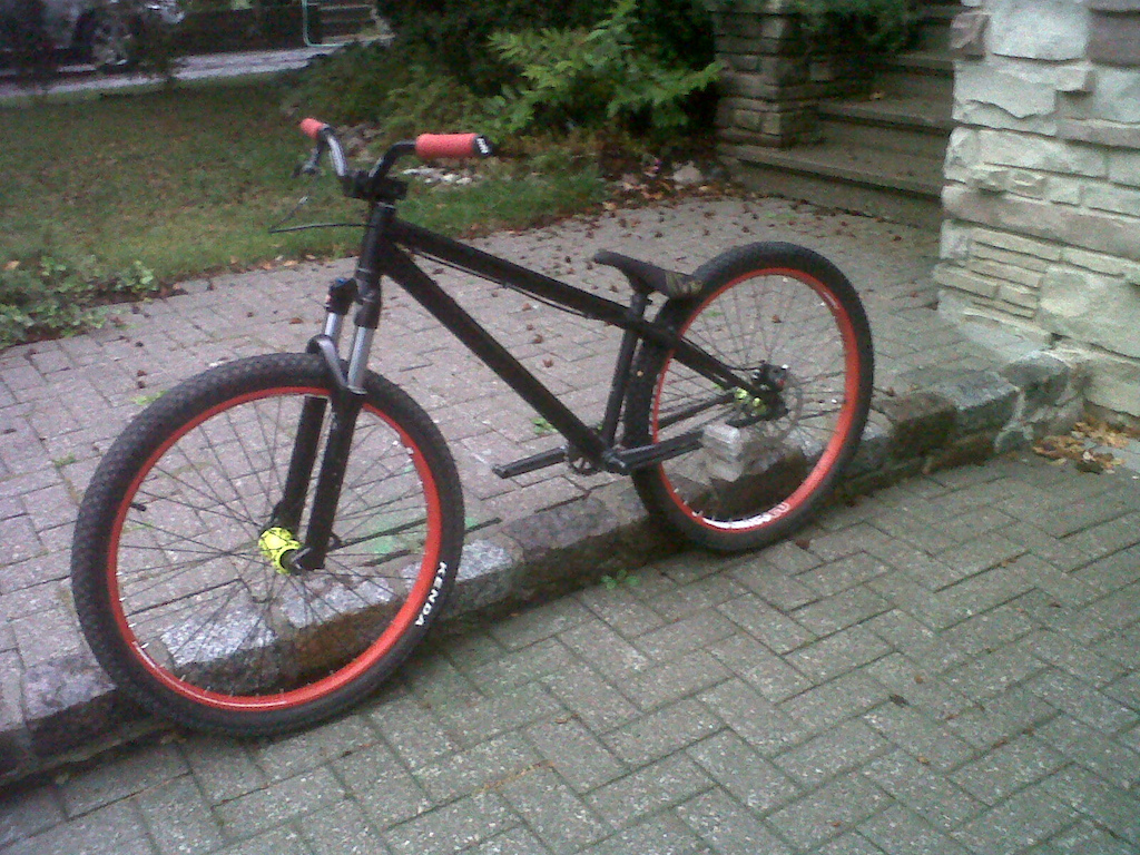 blk mrkt riot frame, argyle 409's, ns fundametal rims, ns 20mm, ns rotary single pro, macniel conjoined cranks, gusset double butted bars, fit stem, avid bb9 break, odi longneck grips, shadow conspiracy seat (with macniel seatpost) k-rad tires, snafu pedals