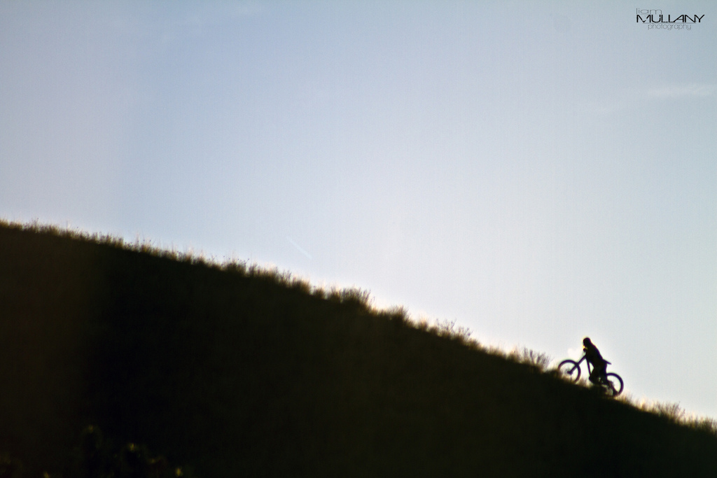 Evan hiking the ridge in the early sun for an upcoming edit